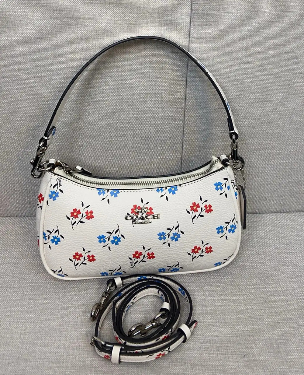 Coach white floral print crescent-shaped underarm bag